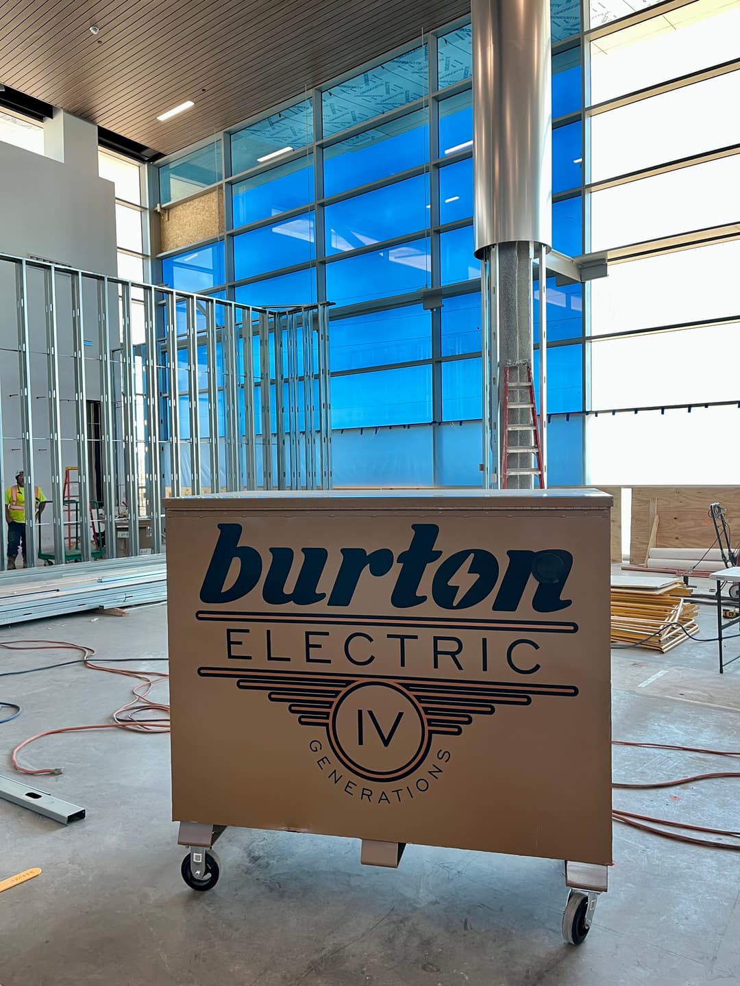 image of 2 burton electrical vans on a jobsite